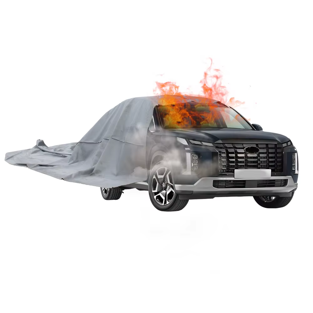 Fire blanket covering a burning car to suppress flames and stop fire spread